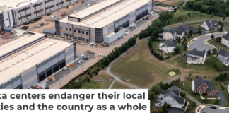 An Amazon data center sits next to a neighborhood in northern Virginia. Nathan Howard/Getty Images